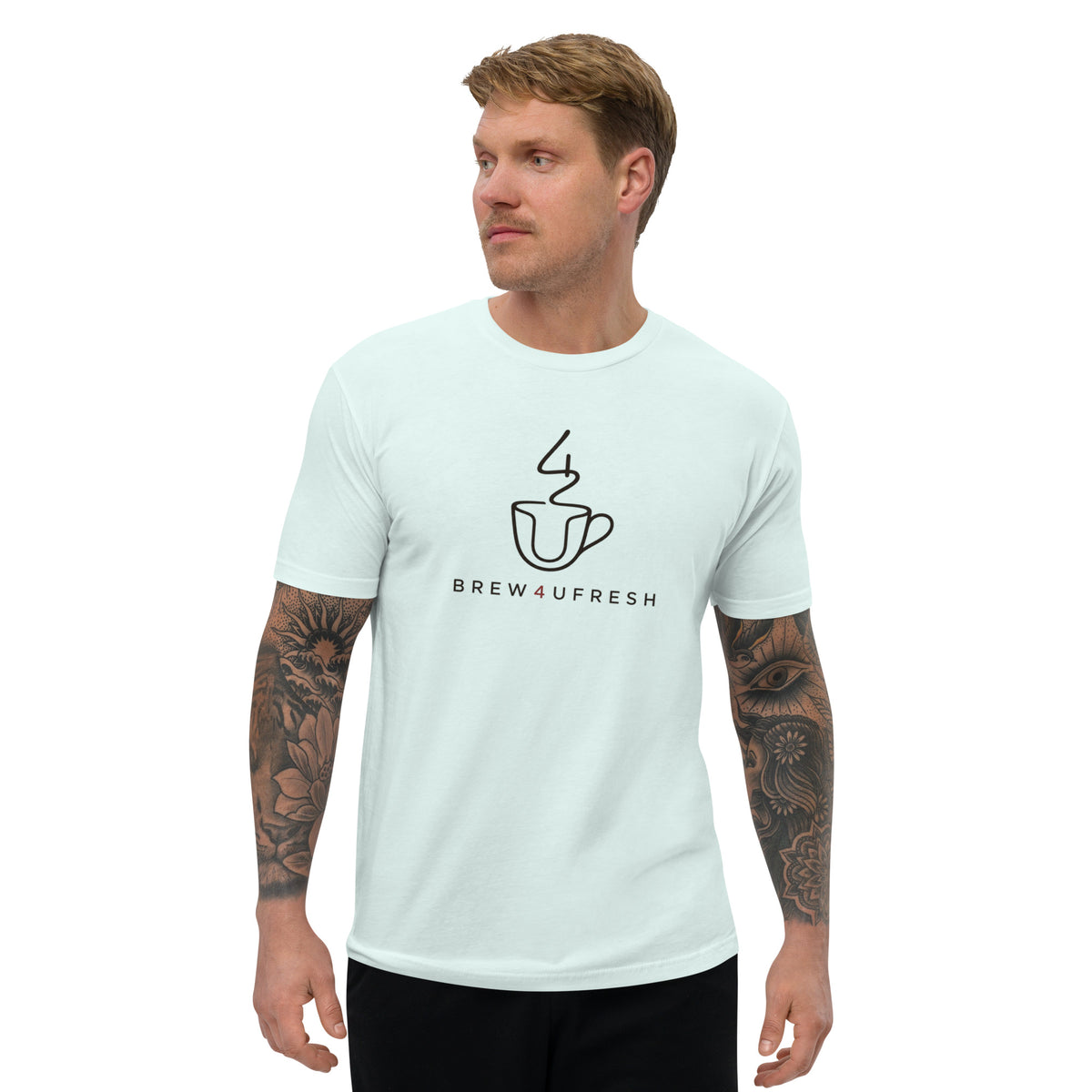 Light blue short sleeve t-shirt featuring a black graphic of a coffee cup and steam, worn casually by a model.