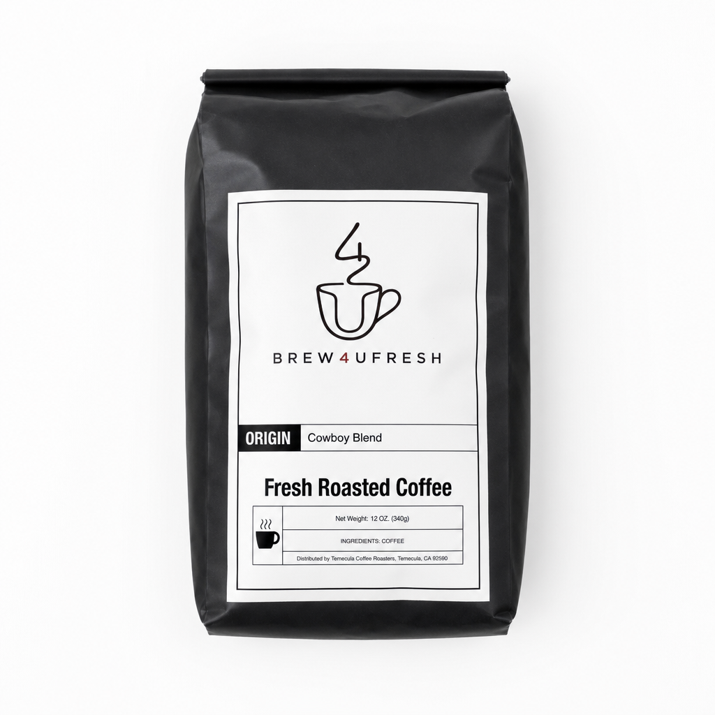 Black bag of Cowboy Blend coffee with a white label, featuring coffee cup logo and product details.