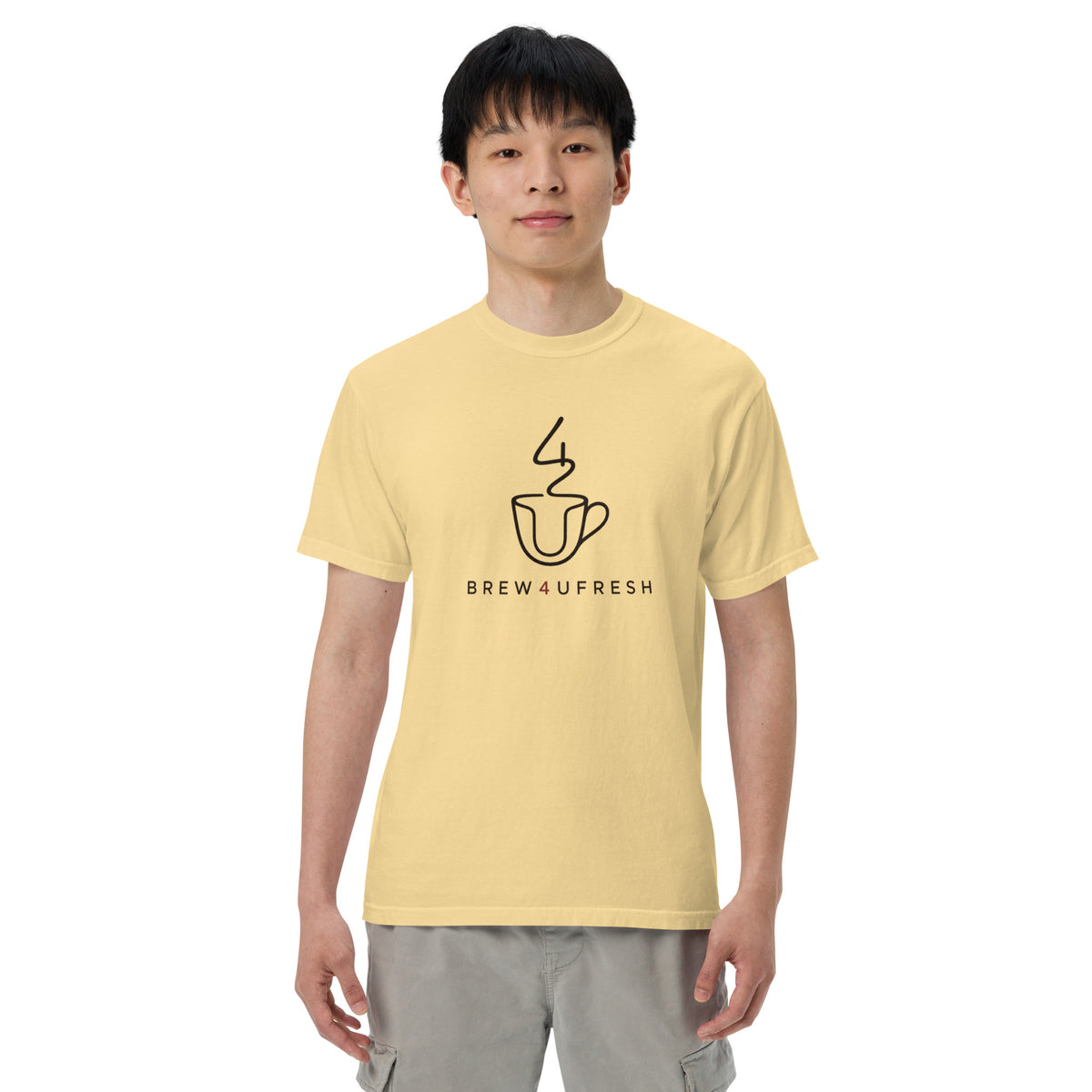 Relaxed-fit, heavyweight tee in soft yellow with a black Brew4UFresh logo, worn by a model standing front-facing.