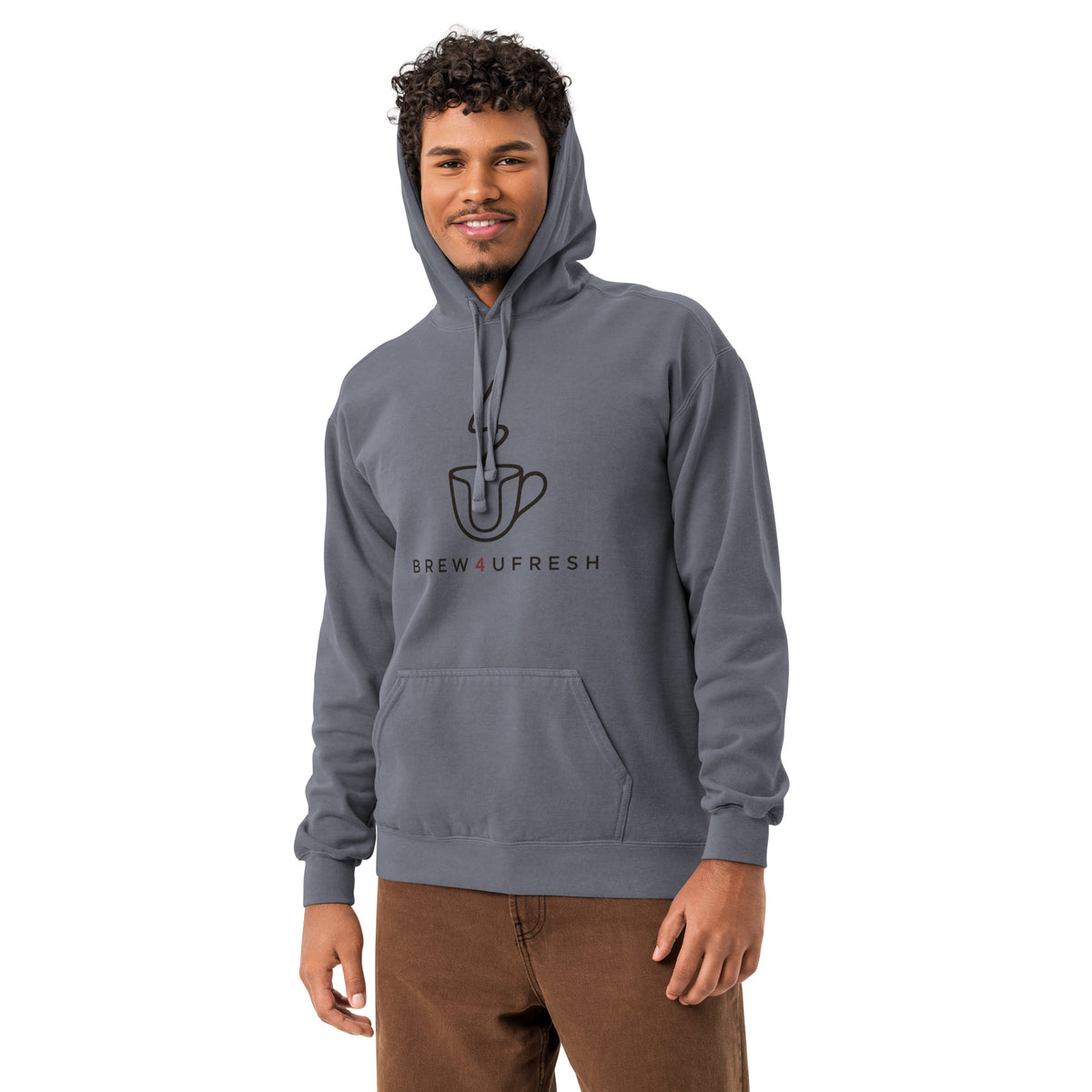 Garment-dyed gray hoodie with a relaxed fit, front pouch pocket, and logo design, worn by a man standing casually.